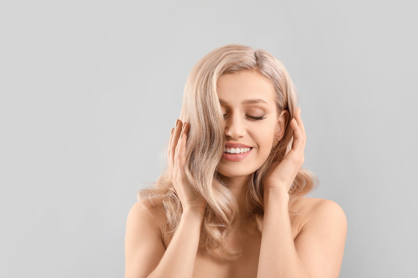 Beauty Portrait of Woman with Wavy Hair